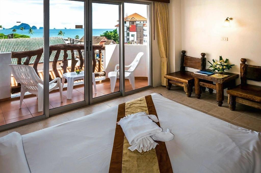 Bedroom and balcony at Aonang Sunset Hotel