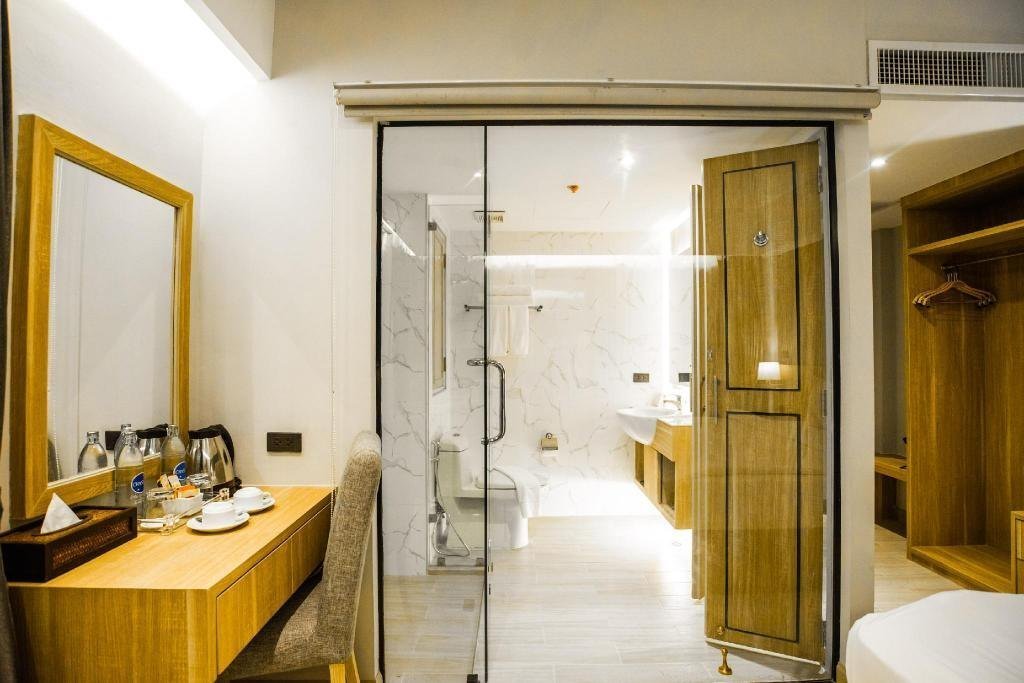 Room and bathroom area at Days Inn by Wyndham Aonang Krabi
