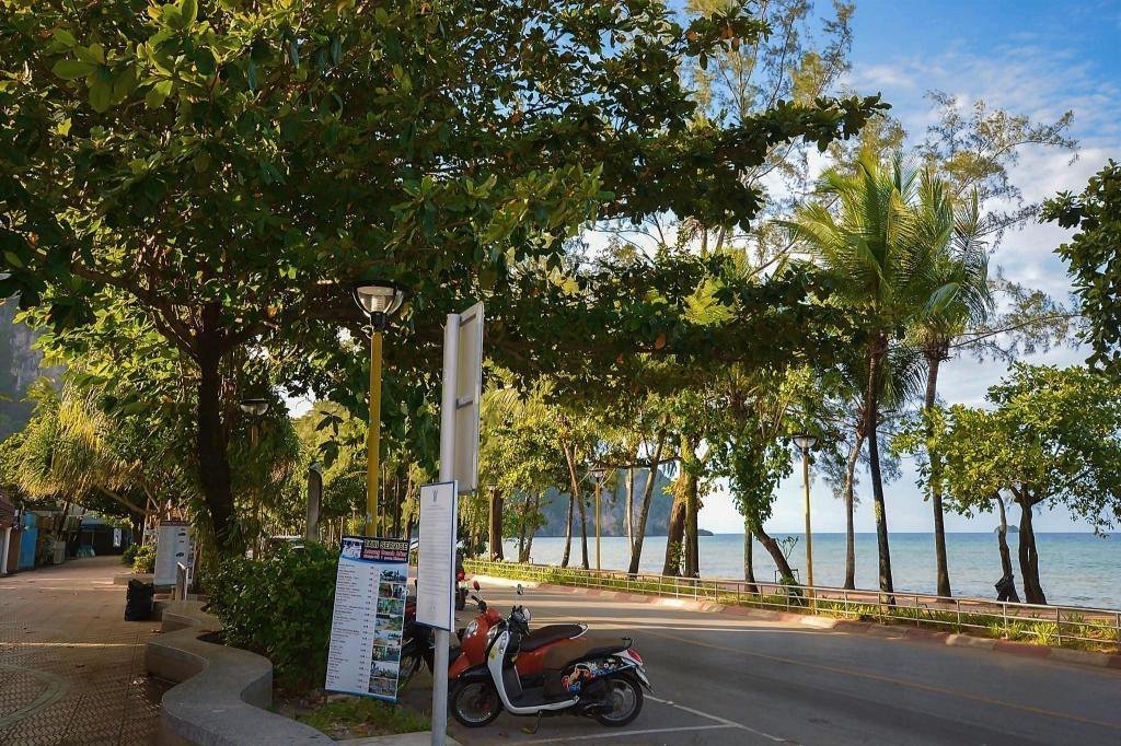Beach road and trees outside iRest Ao Nang Sea Front