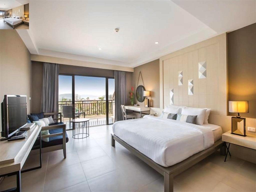 Bedroom and balcony at Krabi La Playa Resort