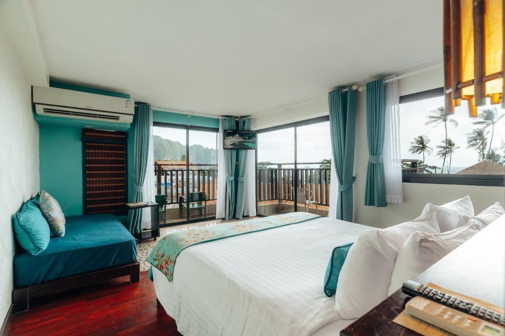 Bedroom with balcony at Vacation Village Phra Nang Inn
